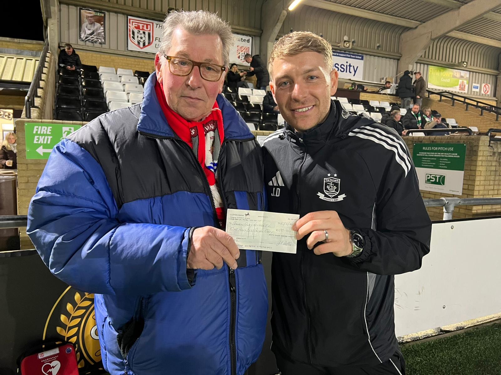 W. Bro Peter Coates presenting £100 cheque to Connah's Quay Nomads FC Manager John Disney