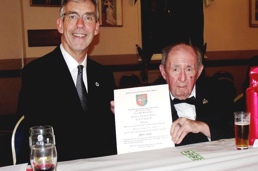 The Late W. Bro Stan Bellis receiving his 50-year Certificate